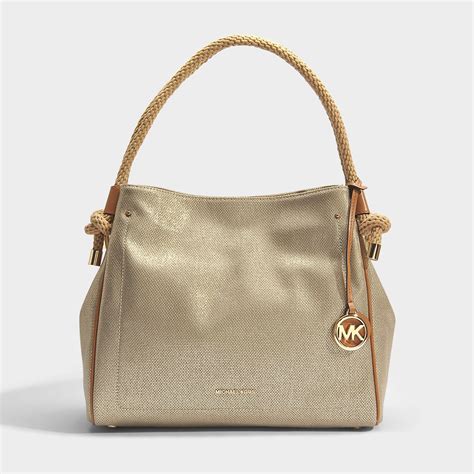 michael kors pale gold|Michael Kors handbags gold.